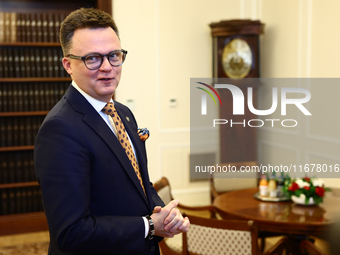 Marshal of the Sejm Szymon Holownia before his meeting with President of Switzerland Viola Amherd at Polish Parliament in Warsaw Poland on O...