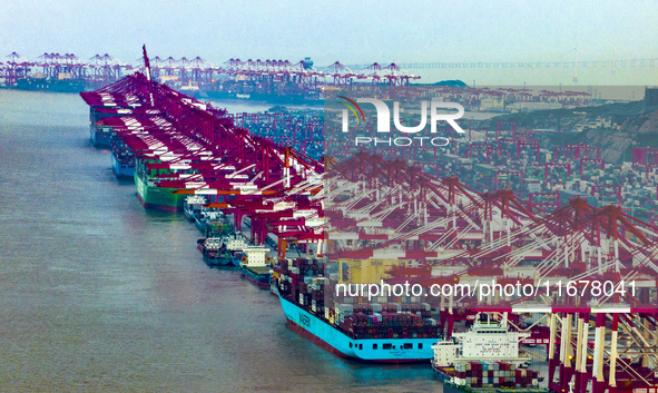 A photo taken in Shanghai, China, on October 18, 2024, shows the operation scene of the Yangshan Deep Water Port area of Shanghai Port. From...