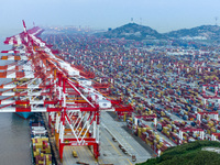 A photo taken in Shanghai, China, on October 18, 2024, shows the operation scene of the Yangshan Deep Water Port area of Shanghai Port. From...