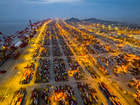 A photo taken in Shanghai, China, on October 18, 2024, shows the operation scene of the Yangshan Deep Water Port area of Shanghai Port. From...