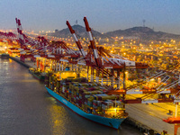 A photo taken in Shanghai, China, on October 18, 2024, shows the operation scene of the Yangshan Deep Water Port area of Shanghai Port. From...