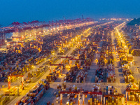 A photo taken in Shanghai, China, on October 18, 2024, shows the operation scene of the Yangshan Deep Water Port area of Shanghai Port. From...