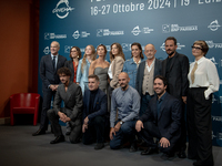 The cast attends the ''Avetrana - Qui Non E Hollywood'' photocall during the 19th Rome Film Festival at Auditorium Parco Della Musica in Rom...