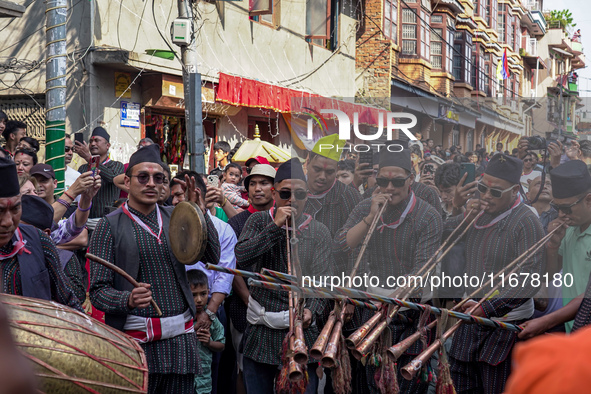 Nepalese Hindu devotees play traditional musical instruments during the Hadigaun Jatra festival in Kathmandu, Nepal, on October 18, 2024. Ev...