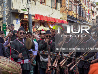 Nepalese Hindu devotees play traditional musical instruments during the Hadigaun Jatra festival in Kathmandu, Nepal, on October 18, 2024. Ev...