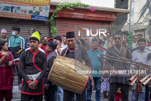 Nepalese Hindu devotees play traditional musical instruments during the Hadigaun Jatra festival in Kathmandu, Nepal, on October 18, 2024. Ev...