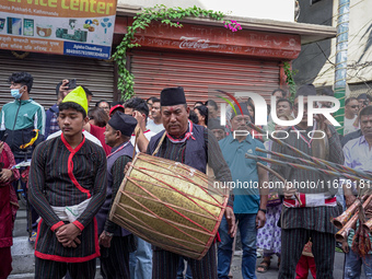 Nepalese Hindu devotees play traditional musical instruments during the Hadigaun Jatra festival in Kathmandu, Nepal, on October 18, 2024. Ev...