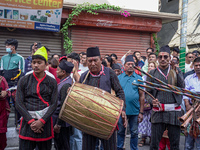 Nepalese Hindu devotees play traditional musical instruments during the Hadigaun Jatra festival in Kathmandu, Nepal, on October 18, 2024. Ev...