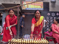 Nepalese Hindu devotees burn oil candles during the Hadigaun Jatra festival in Kathmandu, Nepal, on October 18, 2024. Every year, people acr...