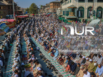 Kashmiri Muslim devotees offer prayers at the shrine of Sufi saint Sheikh Syed Abdul Qadir Jeelani, marking the last Friday of 'urs', or the...