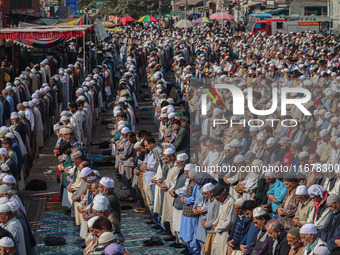 Kashmiri Muslim devotees offer prayers at the shrine of Sufi saint Sheikh Syed Abdul Qadir Jeelani, marking the last Friday of 'urs', or the...