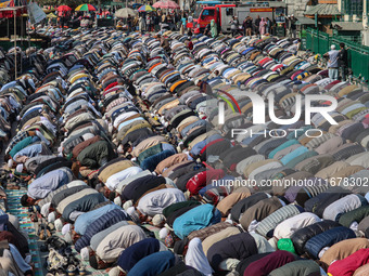 Kashmiri Muslim devotees offer prayers at the shrine of Sufi saint Sheikh Syed Abdul Qadir Jeelani, marking the last Friday of 'urs', or the...