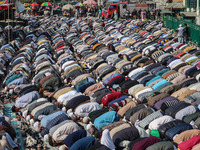 Kashmiri Muslim devotees offer prayers at the shrine of Sufi saint Sheikh Syed Abdul Qadir Jeelani, marking the last Friday of 'urs', or the...