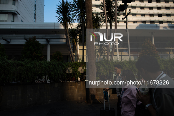 People walk on the pedestrian during rush hour ahead of the presidential inauguration in Jakarta, Indonesia, on October 18, 2024. Prabowo an...