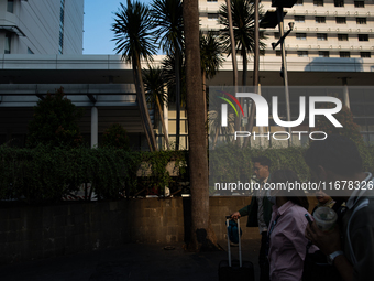 People walk on the pedestrian during rush hour ahead of the presidential inauguration in Jakarta, Indonesia, on October 18, 2024. Prabowo an...