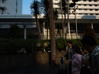 People walk on the pedestrian during rush hour ahead of the presidential inauguration in Jakarta, Indonesia, on October 18, 2024. Prabowo an...