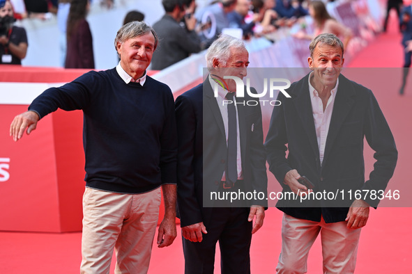 Piero Gros, Gustavo Thoeni, and Paolo di Chiesa attend the ''LA VALANGA AZZURRA'' red carpet during the 19th Rome Film Festival at Auditoriu...