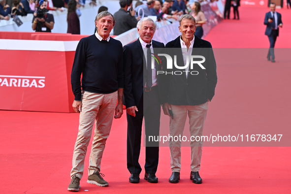 Piero Gros, Gustavo Thoeni, and Paolo di Chiesa attend the ''LA VALANGA AZZURRA'' red carpet during the 19th Rome Film Festival at Auditoriu...