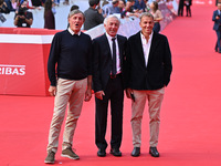 Piero Gros, Gustavo Thoeni, and Paolo di Chiesa attend the ''LA VALANGA AZZURRA'' red carpet during the 19th Rome Film Festival at Auditoriu...