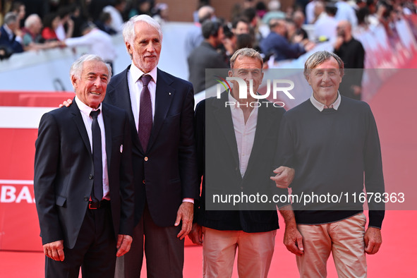 Gustavo Thoeni, Giovanni Malago, Paolo di Chiesa, and Piero Gros attend the ''LA VALANGA AZZURRA'' red carpet during the 19th Rome Film Fest...