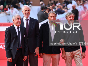 Gustavo Thoeni, Giovanni Malago, Paolo di Chiesa, and Piero Gros attend the ''LA VALANGA AZZURRA'' red carpet during the 19th Rome Film Fest...