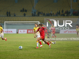 Players of Nepal and Bhutan play against each other during the SAFF Women's Championship 2024 in Kathmandu, Nepal, on October 18, 2024. Nepa...