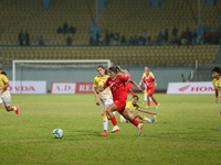 Players of Nepal and Bhutan play against each other during the SAFF Women's Championship 2024 in Kathmandu, Nepal, on October 18, 2024. Nepa...