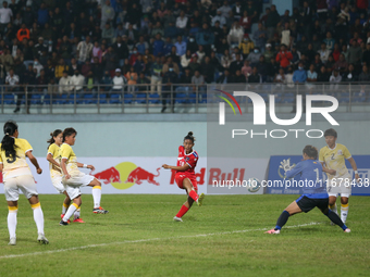 Players of Nepal and Bhutan play against each other during the SAFF Women's Championship 2024 in Kathmandu, Nepal, on October 18, 2024. Nepa...