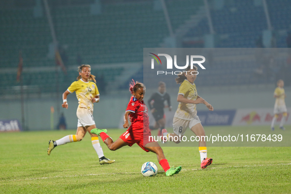 Players of Nepal and Bhutan play against each other during the SAFF Women's Championship 2024 in Kathmandu, Nepal, on October 18, 2024. Nepa...