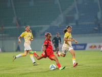 Players of Nepal and Bhutan play against each other during the SAFF Women's Championship 2024 in Kathmandu, Nepal, on October 18, 2024. Nepa...