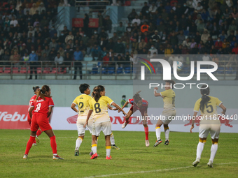 Players of Nepal and Bhutan play against each other during the SAFF Women's Championship 2024 in Kathmandu, Nepal, on October 18, 2024. Nepa...