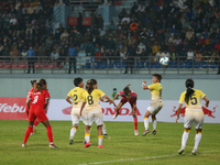 Players of Nepal and Bhutan play against each other during the SAFF Women's Championship 2024 in Kathmandu, Nepal, on October 18, 2024. Nepa...