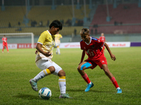 Players of Nepal and Bhutan play against each other during the SAFF Women's Championship 2024 in Kathmandu, Nepal, on October 18, 2024. Nepa...