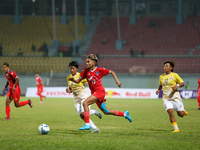 Players of Nepal and Bhutan play against each other during the SAFF Women's Championship 2024 in Kathmandu, Nepal, on October 18, 2024. Nepa...