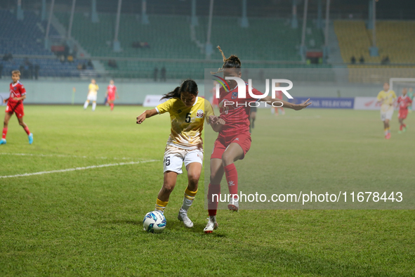 Players of Nepal and Bhutan play against each other during the SAFF Women's Championship 2024 in Kathmandu, Nepal, on October 18, 2024. Nepa...