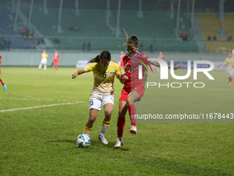 Players of Nepal and Bhutan play against each other during the SAFF Women's Championship 2024 in Kathmandu, Nepal, on October 18, 2024. Nepa...