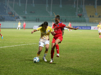 Players of Nepal and Bhutan play against each other during the SAFF Women's Championship 2024 in Kathmandu, Nepal, on October 18, 2024. Nepa...