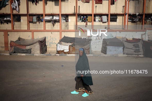 Displaced Palestinians are in Deir al-Balah in the central Gaza Strip on October 18, 2024, amid the ongoing war between Israel and the Pales...