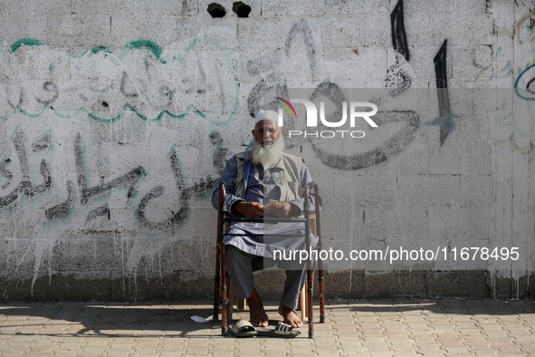 Displaced Palestinians are in Deir al-Balah in the central Gaza Strip on October 18, 2024, amid the ongoing war between Israel and the Pales...