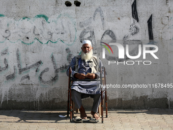 Displaced Palestinians are in Deir al-Balah in the central Gaza Strip on October 18, 2024, amid the ongoing war between Israel and the Pales...