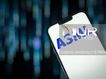 In this photo illustration, the logo of ASML is seen on a phone, in Warsaw, Poland, on October 18, 2024. (