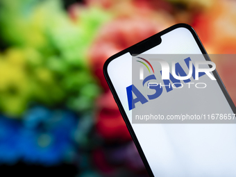 In this photo illustration, the logo of ASML is seen on a phone, in Warsaw, Poland, on October 18, 2024. (