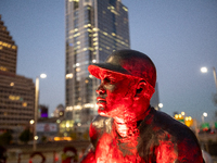 Spectators and participants are seen during the 2024 Blink Art and Light Festival in Cincinnati, Ohio, on October 17, 2024. (