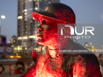 Spectators and participants are seen during the 2024 Blink Art and Light Festival in Cincinnati, Ohio, on October 17, 2024. (