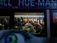 Spectators and participants are seen during the 2024 Blink Art and Light Festival in Cincinnati, Ohio, on October 17, 2024. (