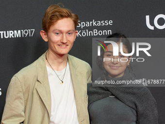 Tanaz Molaei, a German actress, and Konrad Neidhardt, a German actor, attend the screening of ''Uferpark - Gute Zeiten, Wilden Zeiten'' at F...