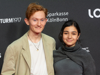 Tanaz Molaei, a German actress, and Konrad Neidhardt, a German actor, attend the screening of ''Uferpark - Gute Zeiten, Wilden Zeiten'' at F...