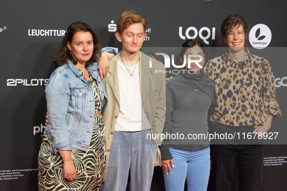 Tanaz Molaei, a German actress, Konrad Neidhardt, a German actor, Helga Lobel, the producer, and Lisa Albers, the film editor, attend the sc...