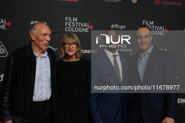 Edwin Moses, a former American hurdler, Anne Merrem, Julian Moses, and Holger Geschwindner attend the screening of ''13 Steps - Die Unglaubl...