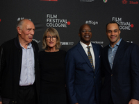 Edwin Moses, a former American hurdler, Anne Merrem, Julian Moses, and Holger Geschwindner attend the screening of ''13 Steps - Die Unglaubl...